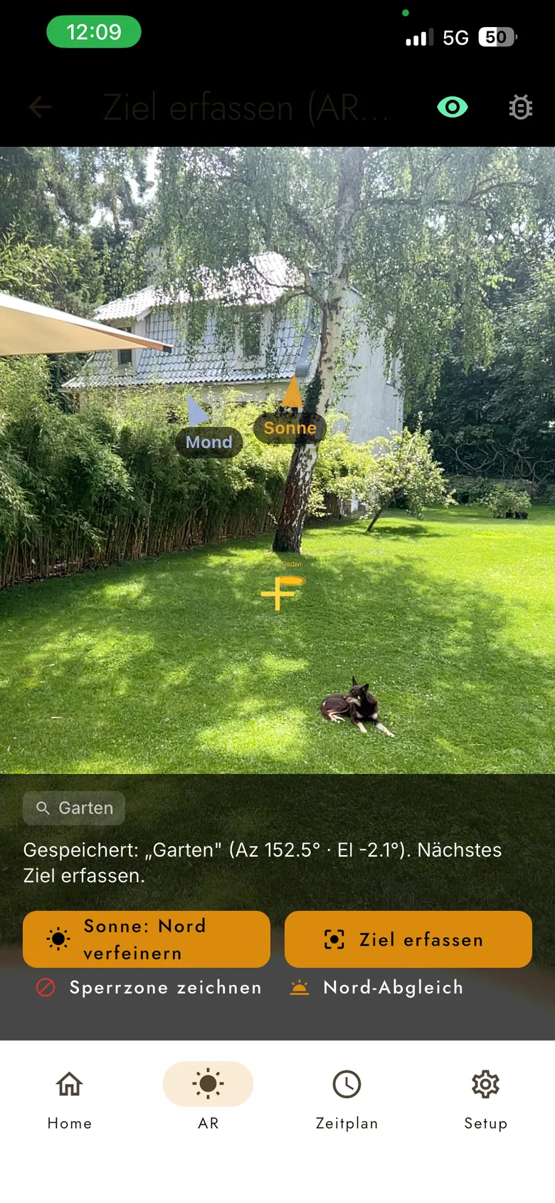 AR-Ansicht der ohoya-App: Sonnen- und Mondbahn live über dem Garten eingeblendet, ein Ziel wird gesetzt