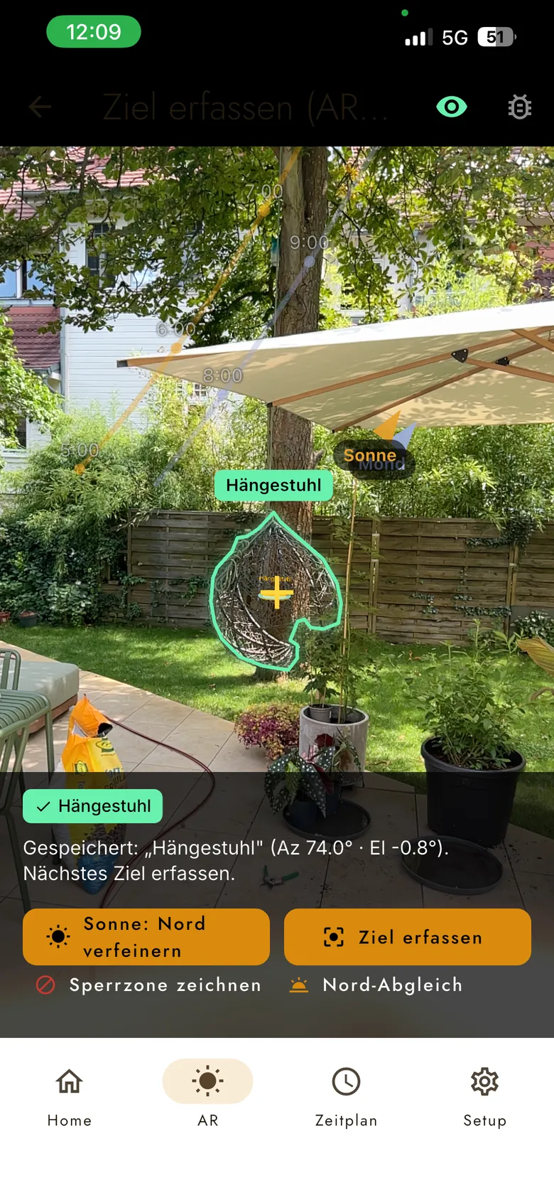 AR-Ansicht der ohoya-App: der Hängestuhl im Garten wird per Fadenkreuz als Ziel angetippt und gespeichert